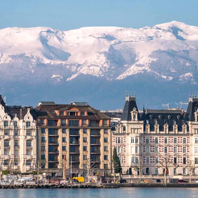 Geneva view in winter with snowy mountains in background