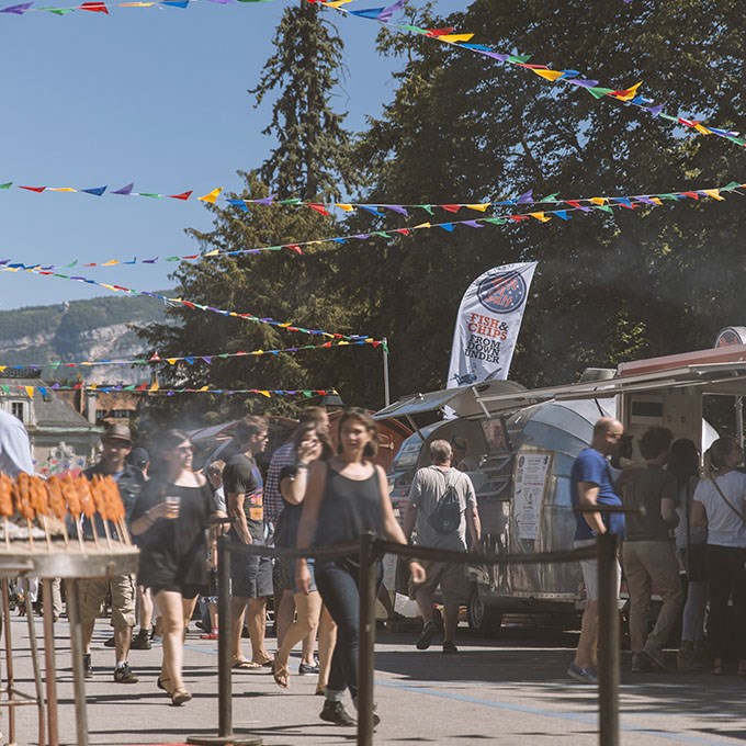 people walking and queuing at a street food festival in geneva 