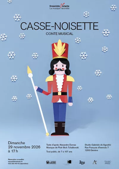 The Nutcracker Un Casse-Noisette en forme de soldat, avec les cheveux, une moustache et des bottes noirs, un chapeau et un costume rouge et doré, tient un septre. Des flocons de neige tombent autour de lui.