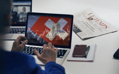 Journaliste, dans la rédaction « Le Temps »