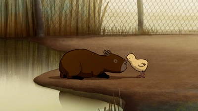 Un capybara et un poussin