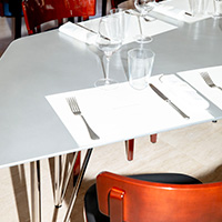 A restaurant table set for lunch, part of Geneva Art Week's Art Tables