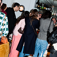 Guests mingling at the after-party at Le Dorian restaurant
